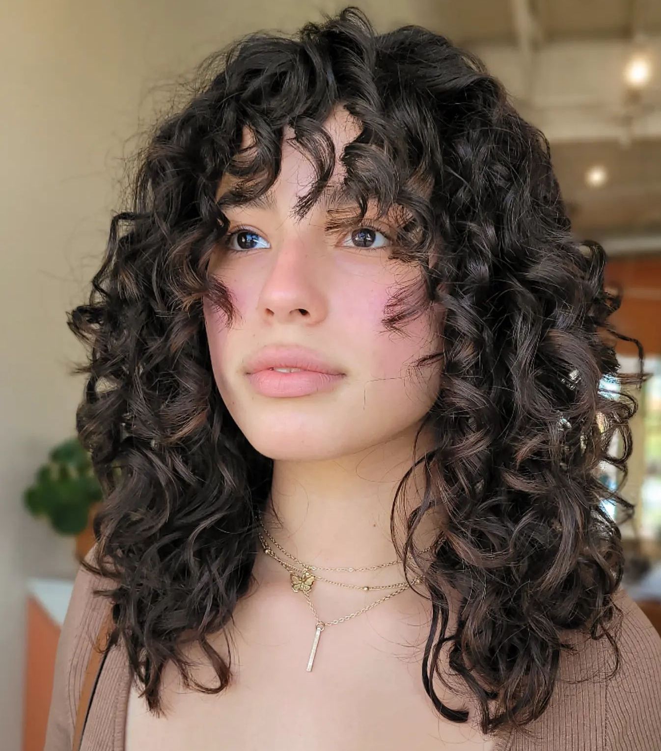 40 Best Curly Hairstyles With Bangs For Women To Try